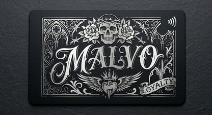 a black rectangular card with an ornate, decorative design and text.